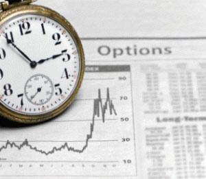 Pocket watch resting on a financial paper showing a stock chart and the word "Options."