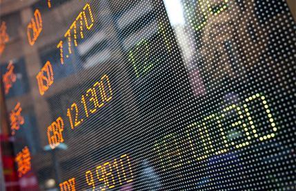 A figure standing on a cracked platform, symbolizing the risks of online share trading.