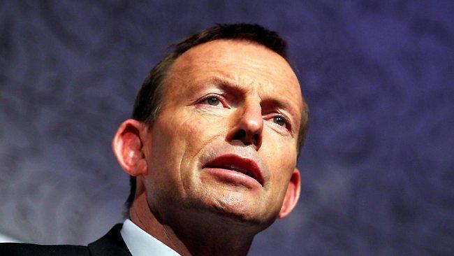Close-up of former Australian Prime Minister Tony Abbott speaking at a podium.
