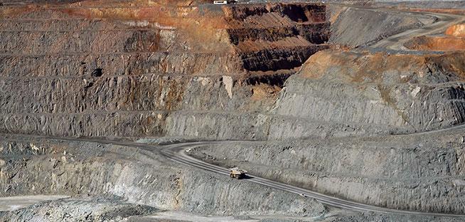 Australian Investment Education traders analyzing the top three mining stocks to identify investment opportunities.