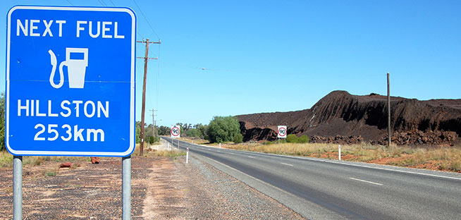 Australian petrol price sign with various fuel types and costs per litre.