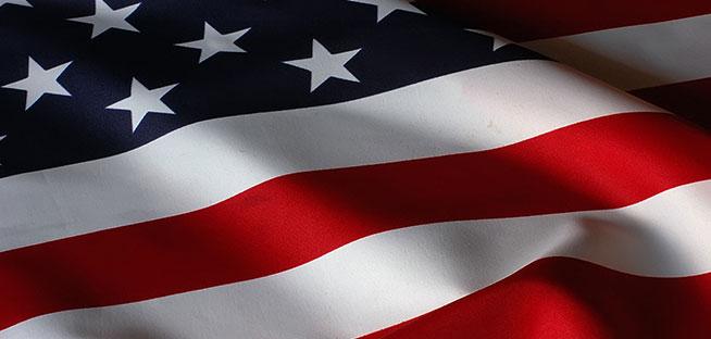 Close-up of a folded, waving United States flag.