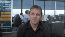 Headshot of Cole Boulter in an office setting.
