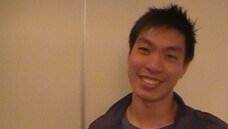 Headshot of Ken Fong from VIC smiling.