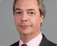 A portrait of a middle-aged man, Nigel Farage, with graying hair, wearing a striped suit, a pink shirt, and a patterned tie against a solid green background.